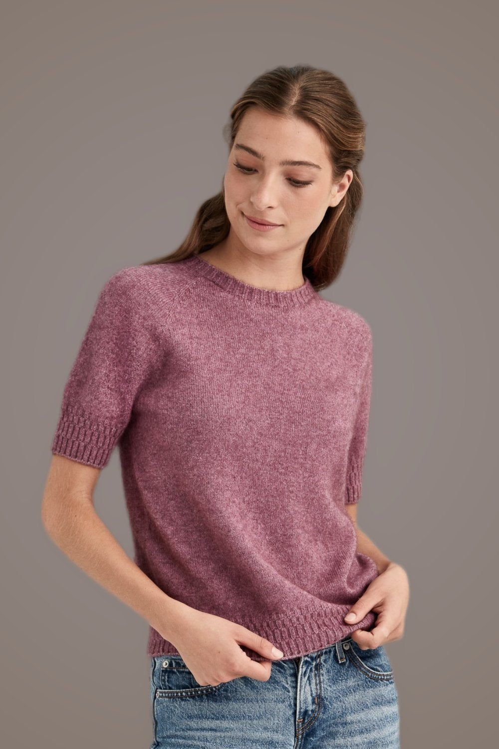 Woman wearing the Stepped Stitch Possum Merino T-Shirt in Heather by McDonald