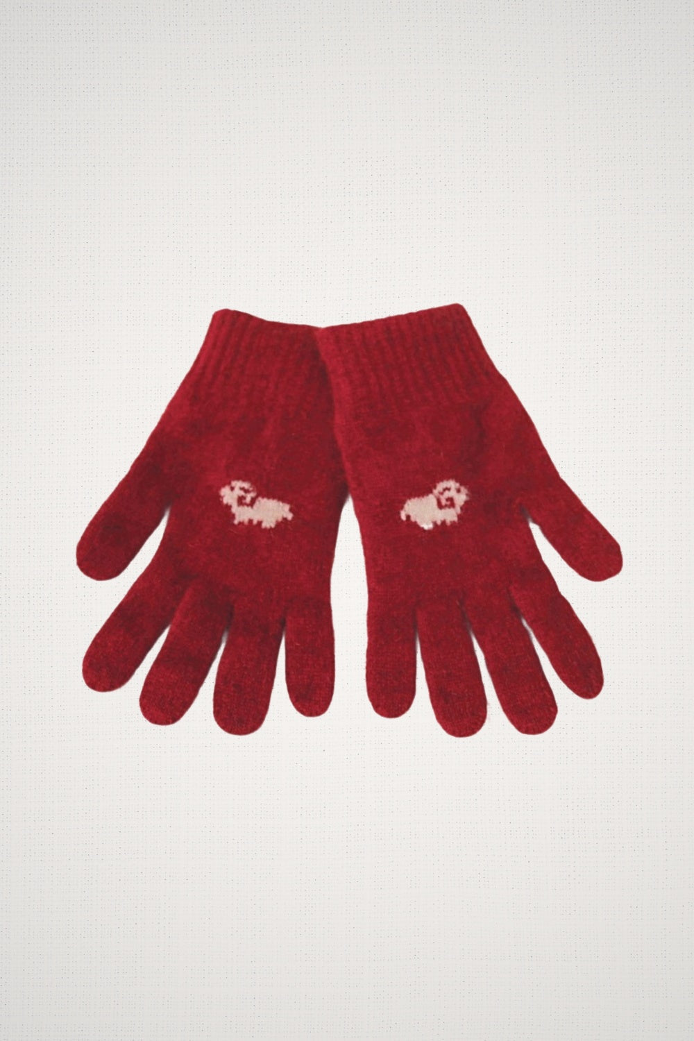 Sheep Possum Merino Gloves in Rata by Koru on a white background