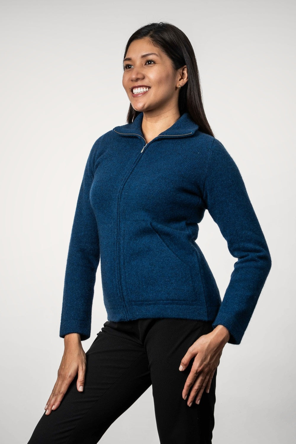 Woman wearing the Zip Possum Merino Jacket in Admiral by Trilogy